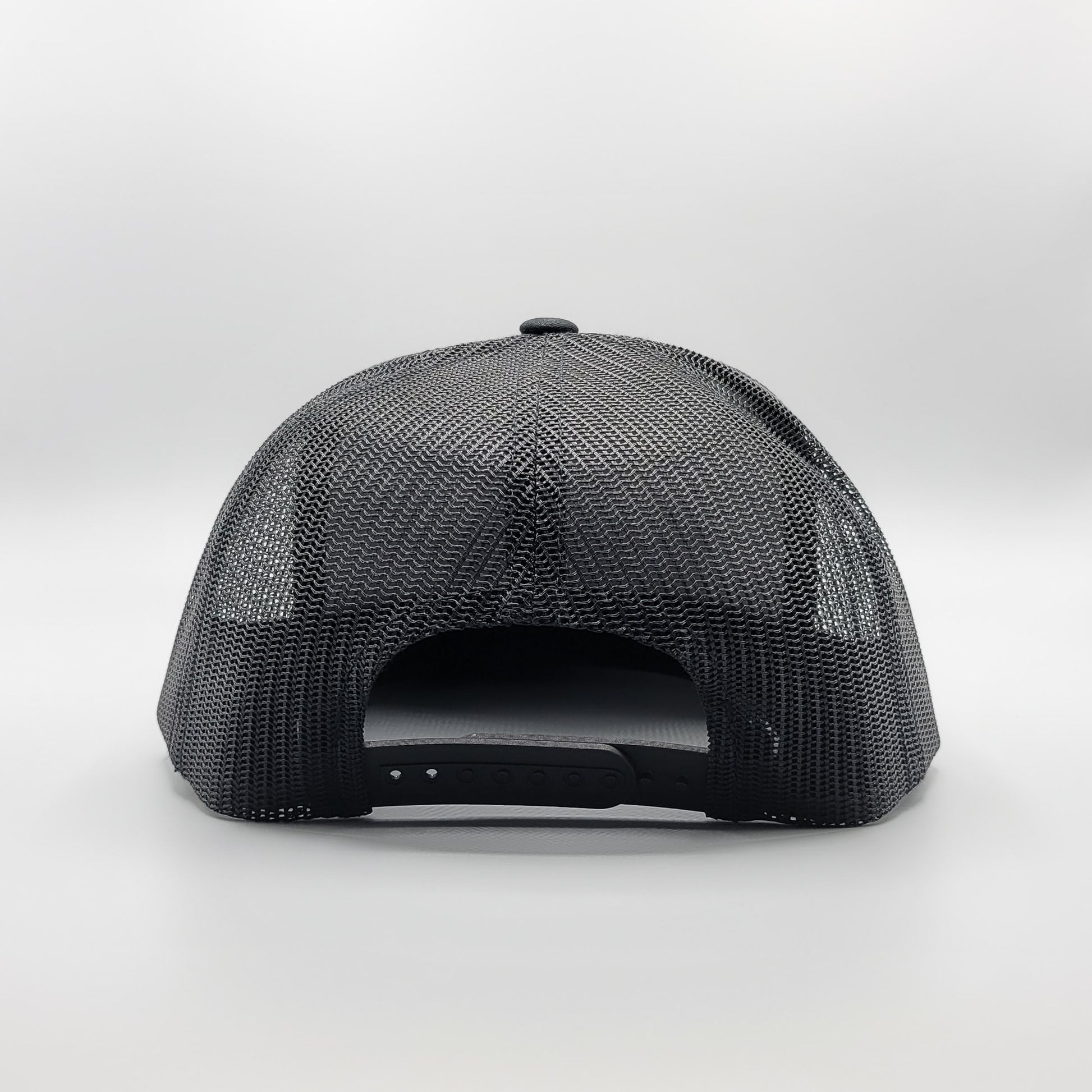 Classic Embroidered Script Trucker Hat On Black Yupoong 6006